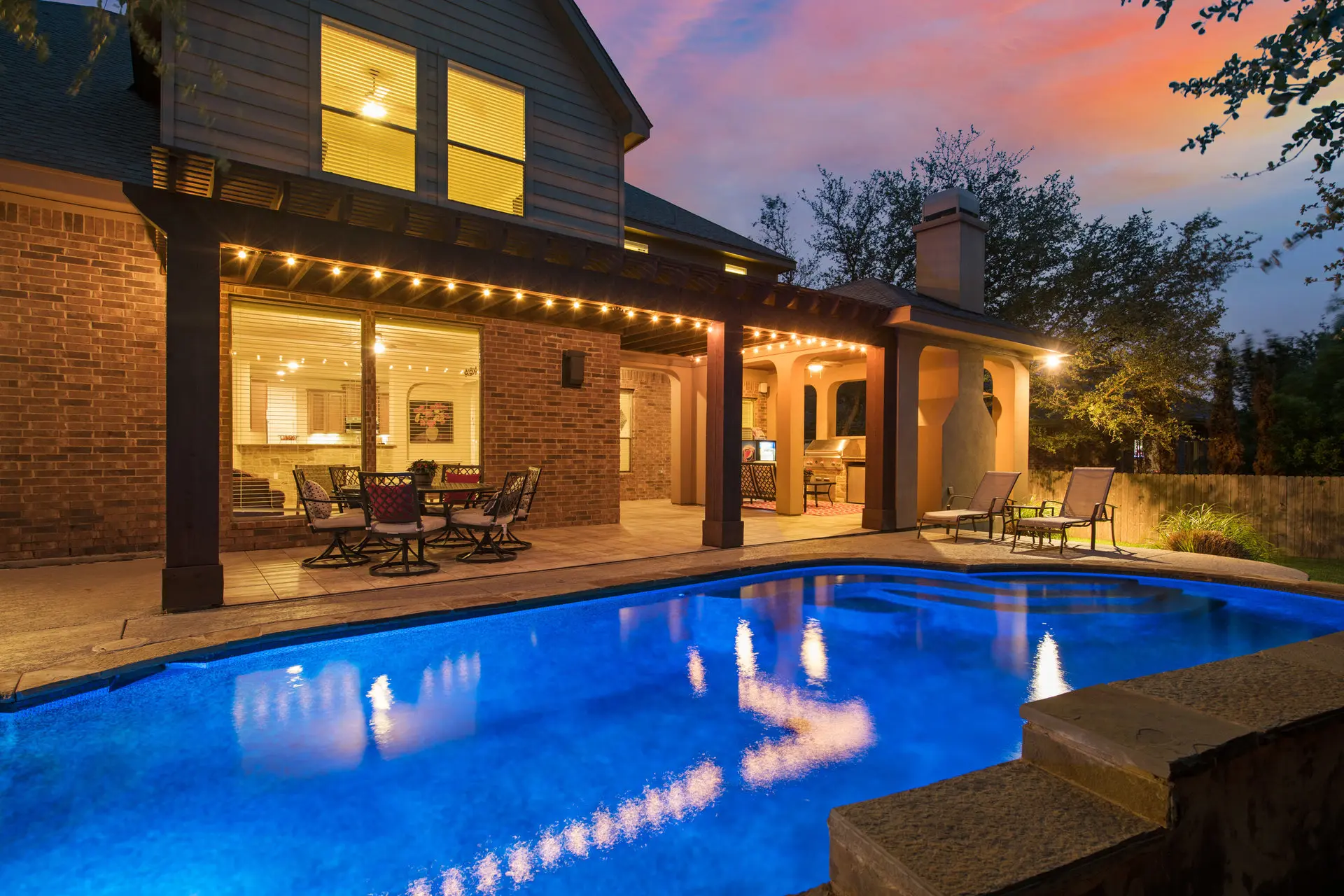 beautiful home with a pool and fireplace in cedar park